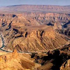 The Fish River Canyon, located close to the border with South Africa, is also the oldest in the world. Researchers have determined that the canyon was formed at least 500 million years ago through water and wind erosion, coupled with the collapse of the valley floor.