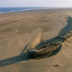 A large number of sailors have died at this coast in Namibia, given the dense fog and the violent storms in the area. In the 1940s, a slate was discovered along with human skeletons. The slate was written by a survivor and directed anyone who found it north. Unfortunately, the wreck had happened close to a century earlier.